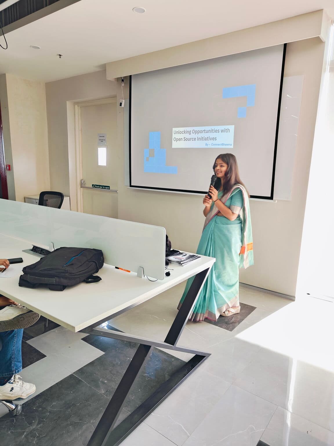 Bhawna presenting Unlocking Opportunities with Open Source Initiatives at a SheBuilds talk